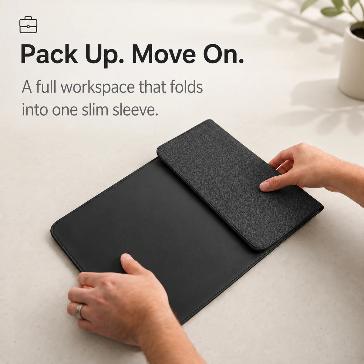 Midnight Black wireless charging laptop sleeve folding into a slim sleeve #color_Midnight Black