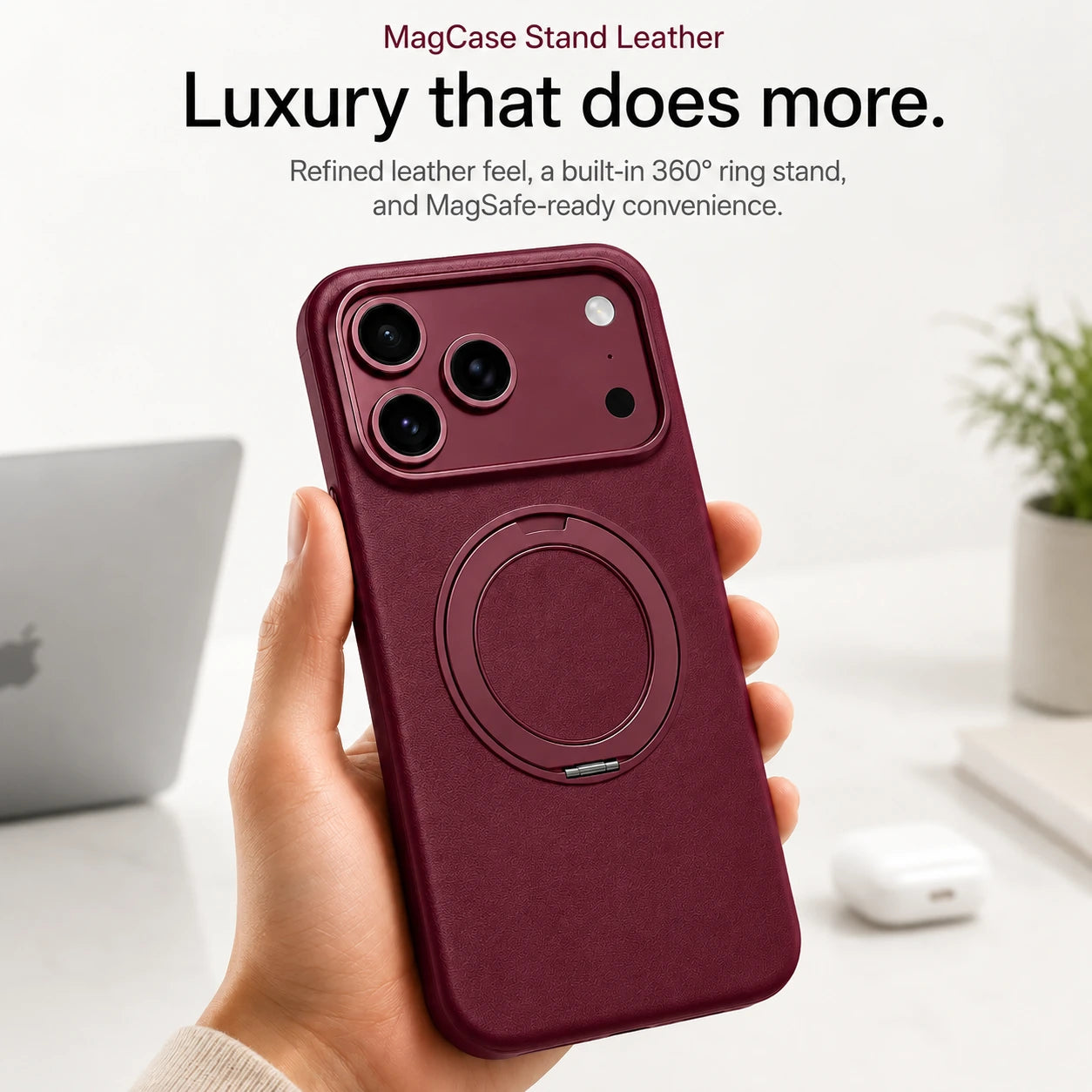 Burgundy leather phone case held upright at a desk with the ring stand folded flat #color_Cherry Red