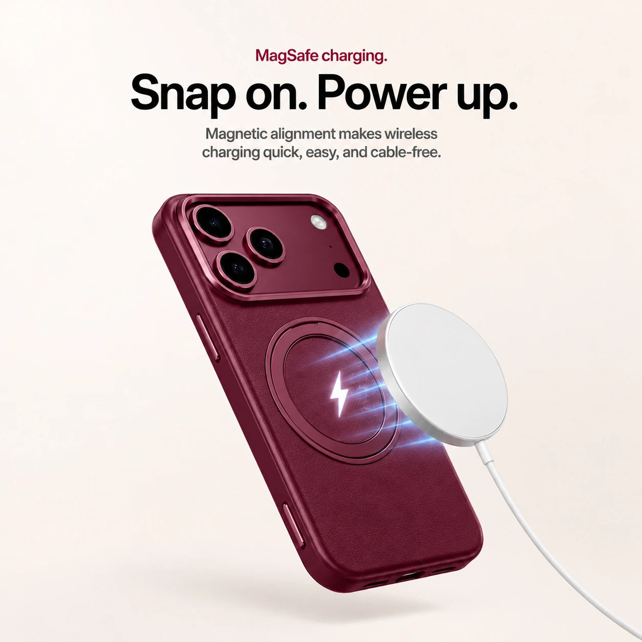 Burgundy leather phone case beside a round magnetic wireless charger and white cable #color_Cherry Red