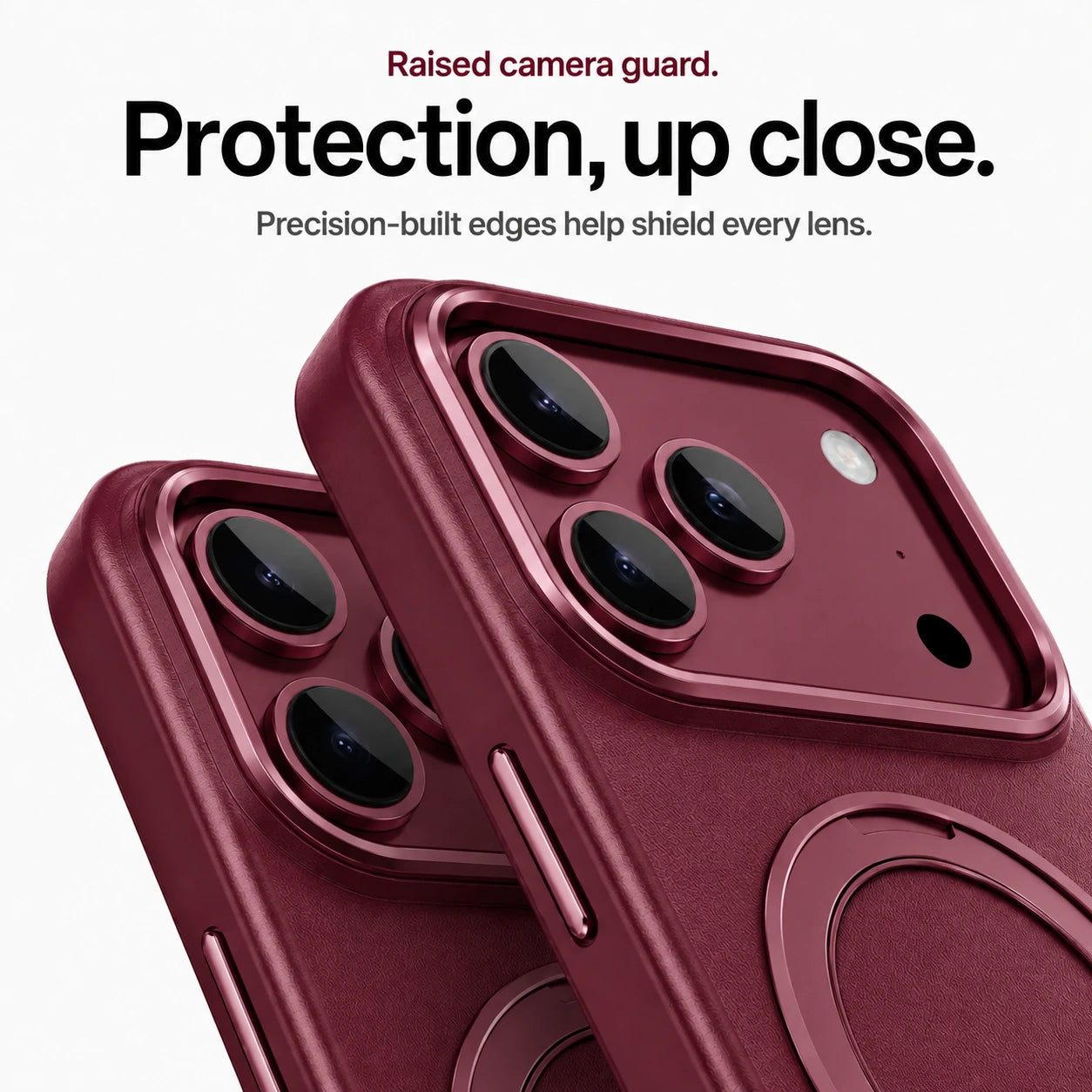 Burgundy leather phone cases in close-up showing raised camera guards and lens trim #color_Cherry Red
