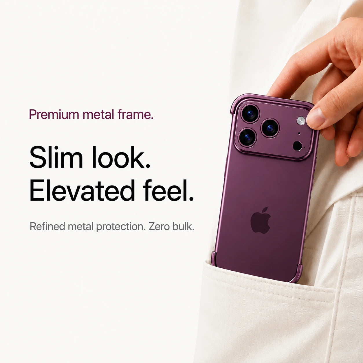 Dark purple minimal metal phone case being placed in a light fabric pocket #color_Dark Cherry