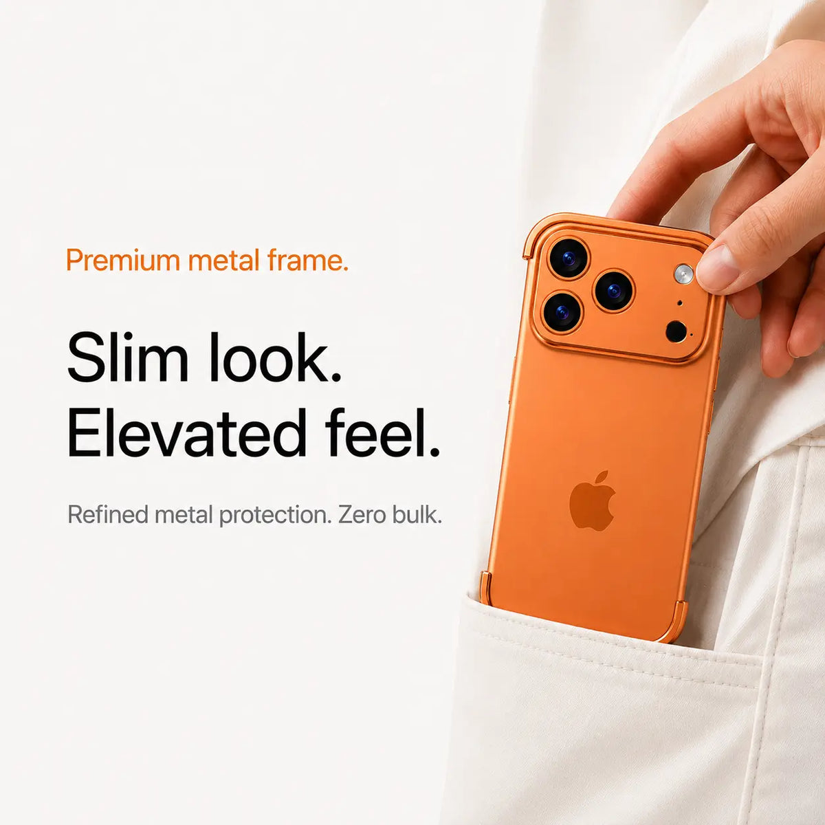 Orange slim metal phone case being placed in a trouser pocket #color_Cosmic Orange