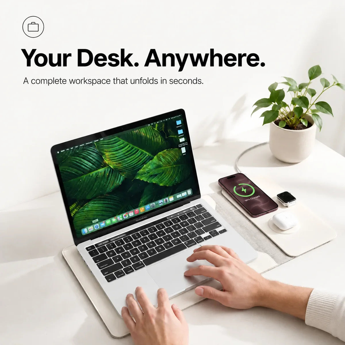 Cloud White wireless charging laptop sleeve opened as a portable workspace. #color_Cloud White