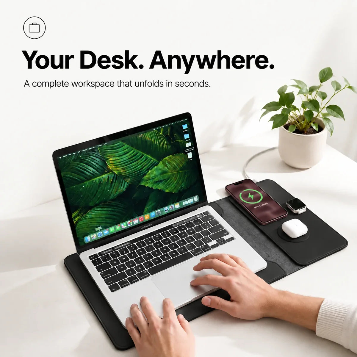 Midnight Black wireless charging laptop sleeve opened as a portable workspace. #color_Midnight Black