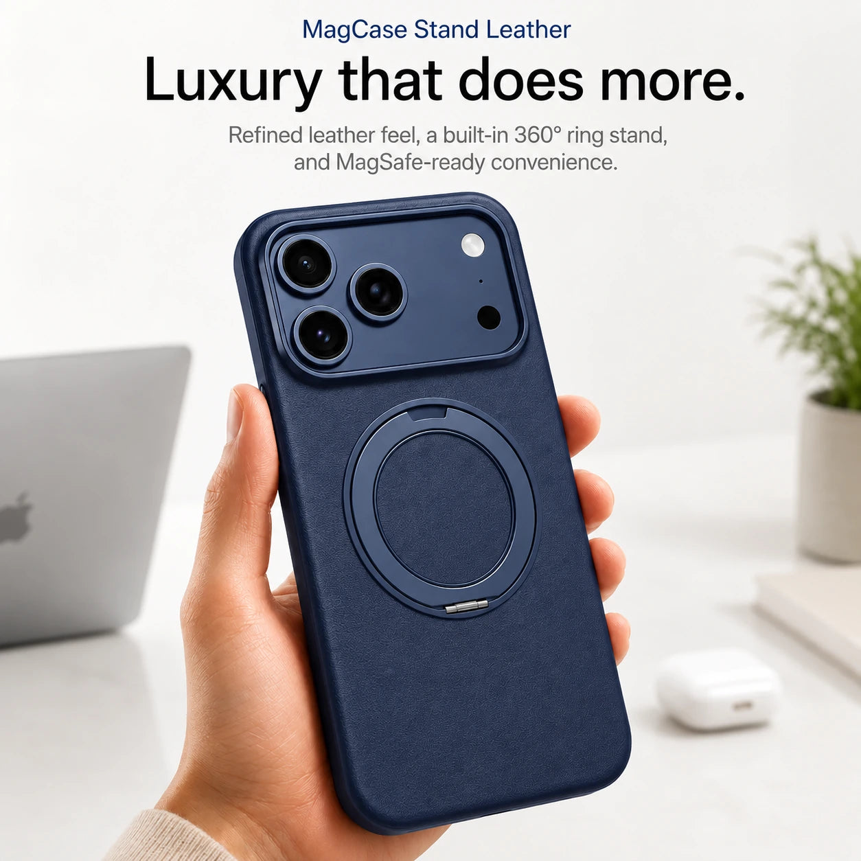 Navy blue leather phone case held upright at a desk with the ring stand folded flat #color_Deep Blue