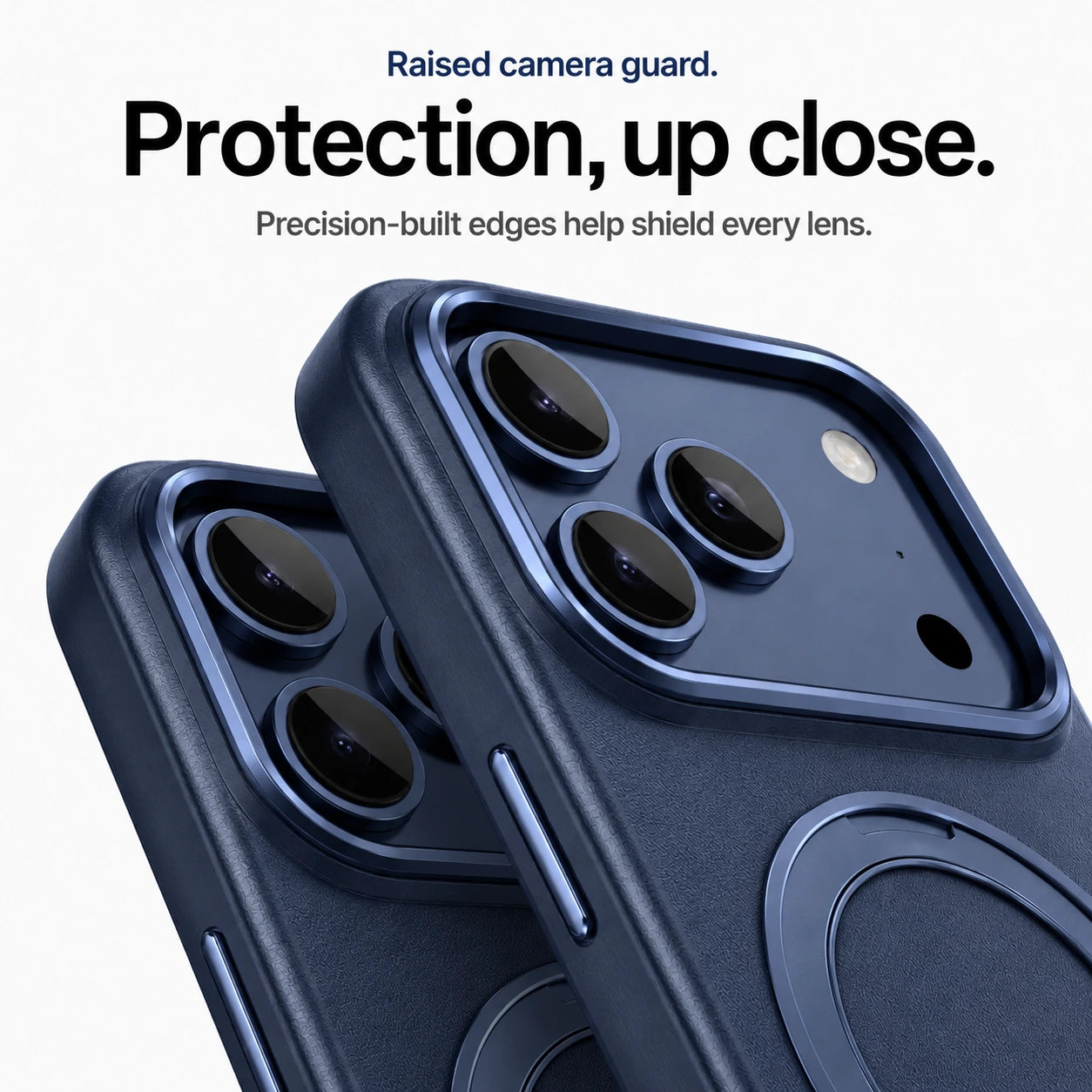 Navy blue leather phone cases in close-up showing raised camera guards and lens trim #color_Deep Blue